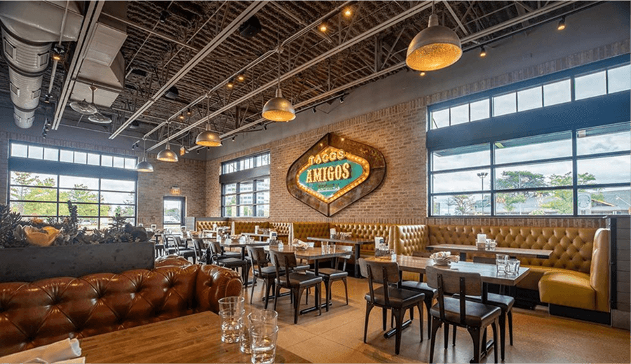 In-ceiling restaurant lighting over dining tables