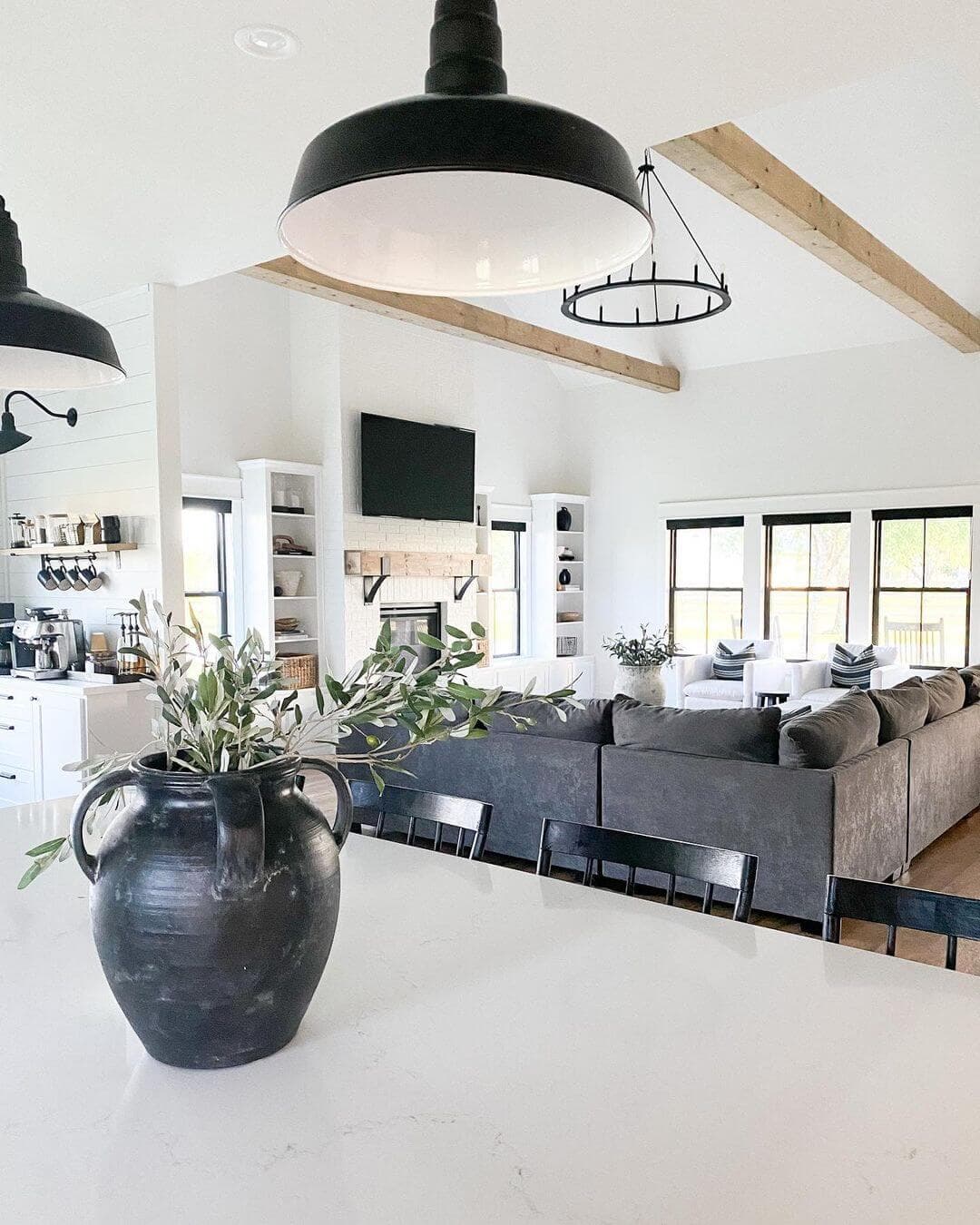 Farmhouse Living Room with Pendant Lights and Chandelier