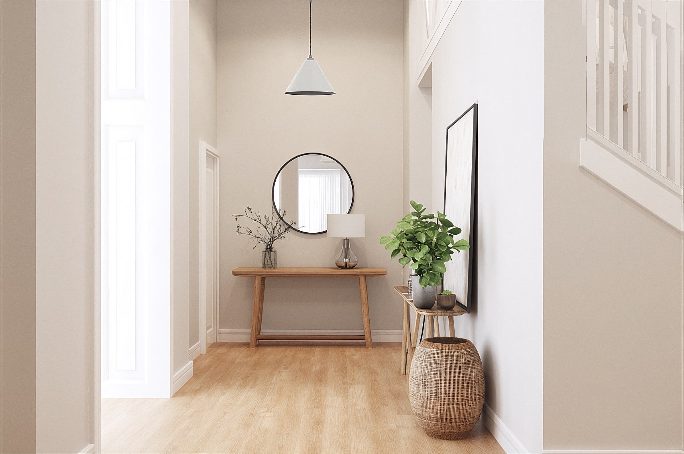 Minimalist hallway with pendant light, wooden console, round mirror, and potted plant for fresh decor.