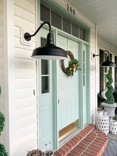 Steel Gooseneck Barn Lights on exterior porch