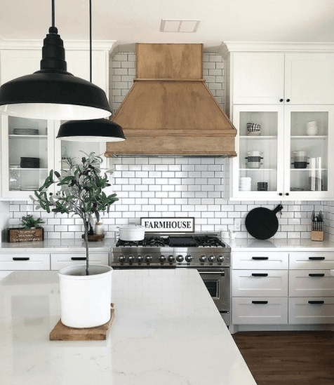 Steel Lighting Co The Manhattan ceiling light fixture in black hanging in a farmhouse style kitchen