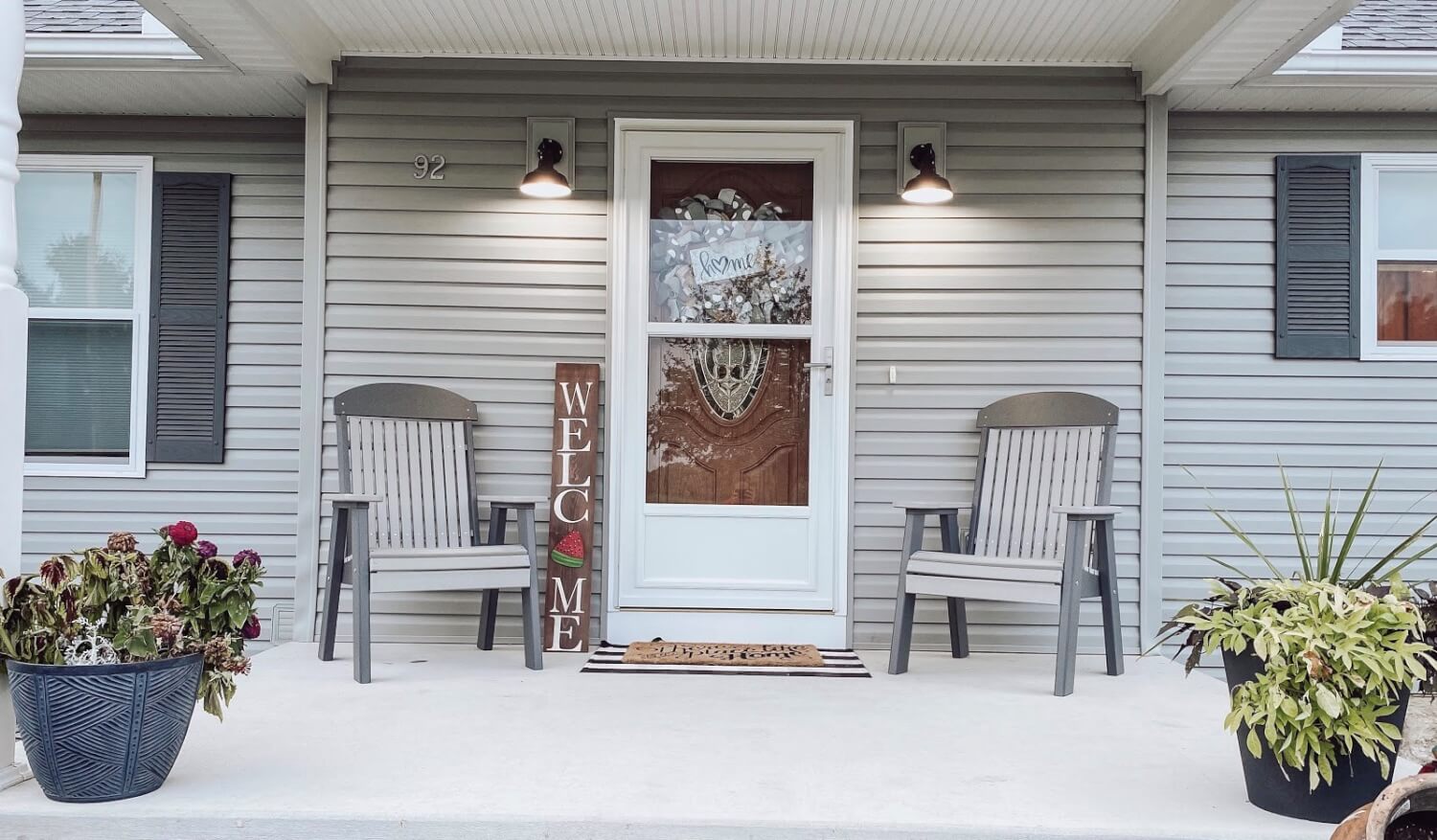 The Hawthorne Barn Sconce Mounted on Porch