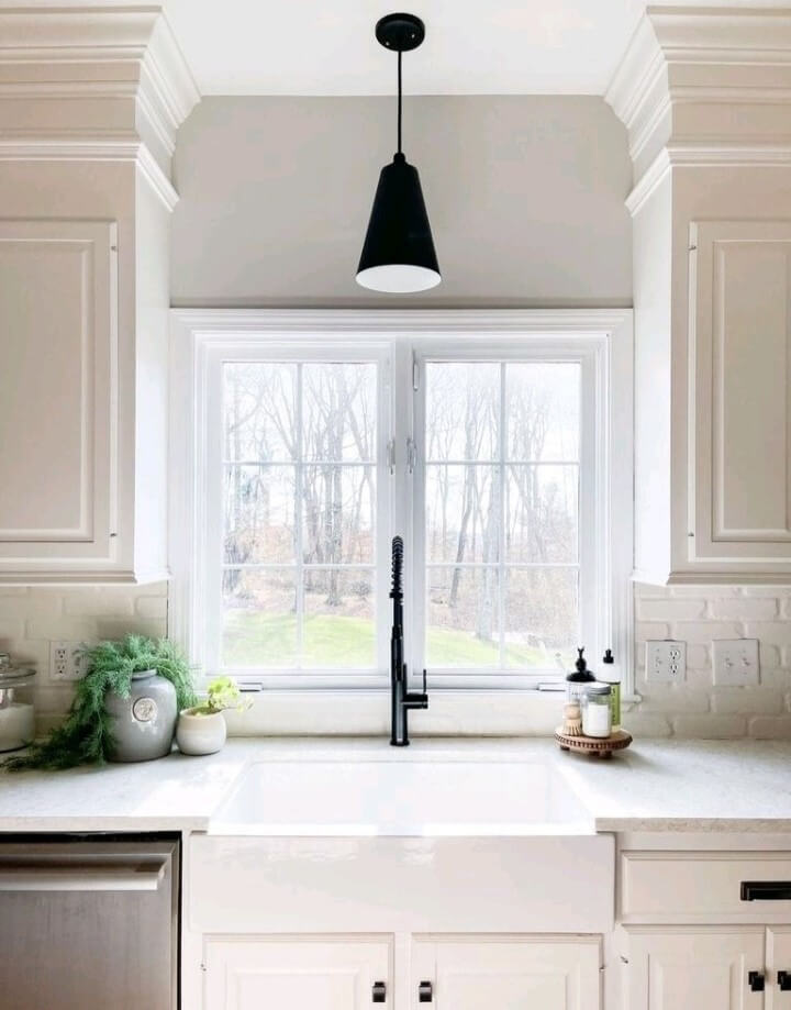 The Laurel Small Pendant Light Hanging Over Sink