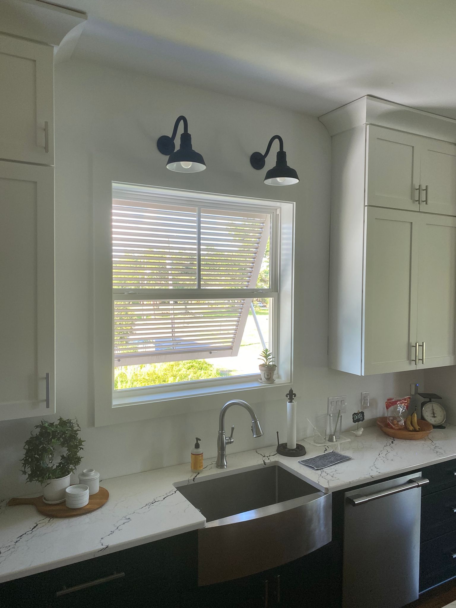 Recessed light over kitchen deals sink distance from wall